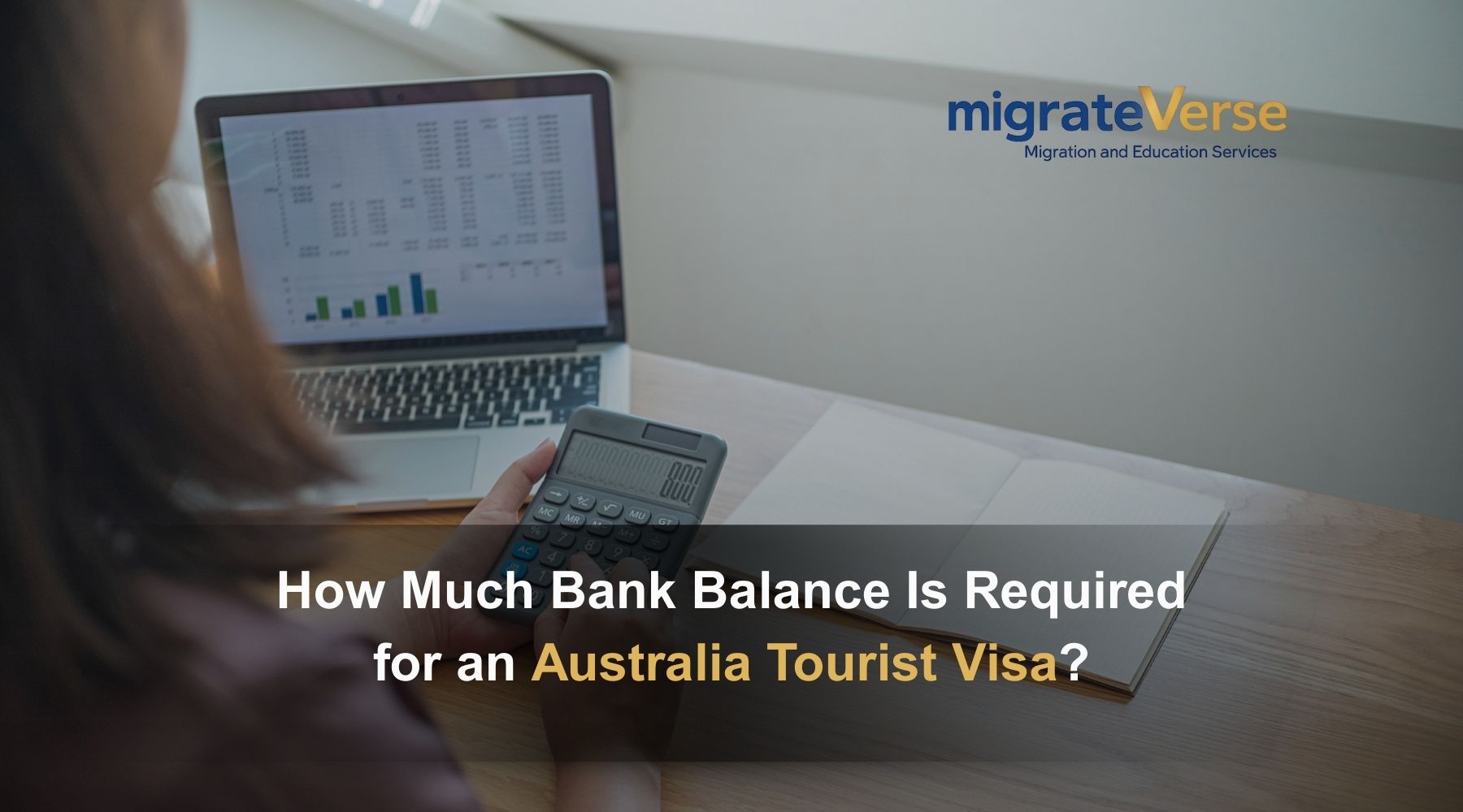 Laptop and calculator with visa inquiry